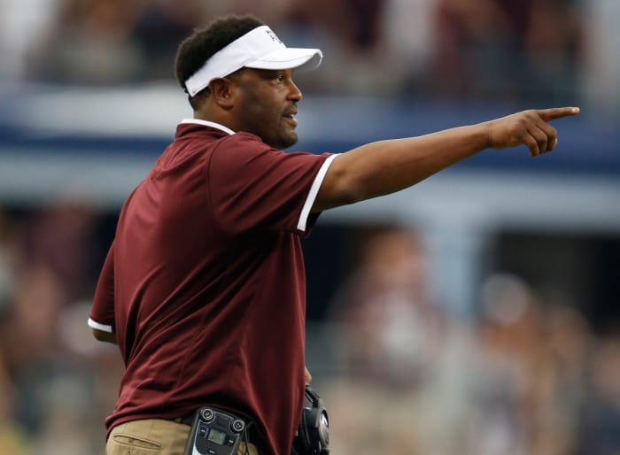 Texas A&M Aggies head coach Kevin Sumlin on the sidelines against the Arkansas Razorbacks at AT&T Stadium.